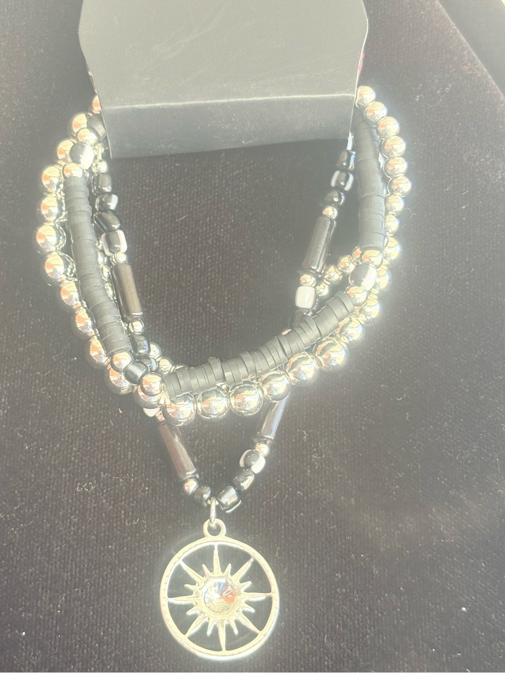 Beaded Black and Silver Sunburst Pendant Bracelet